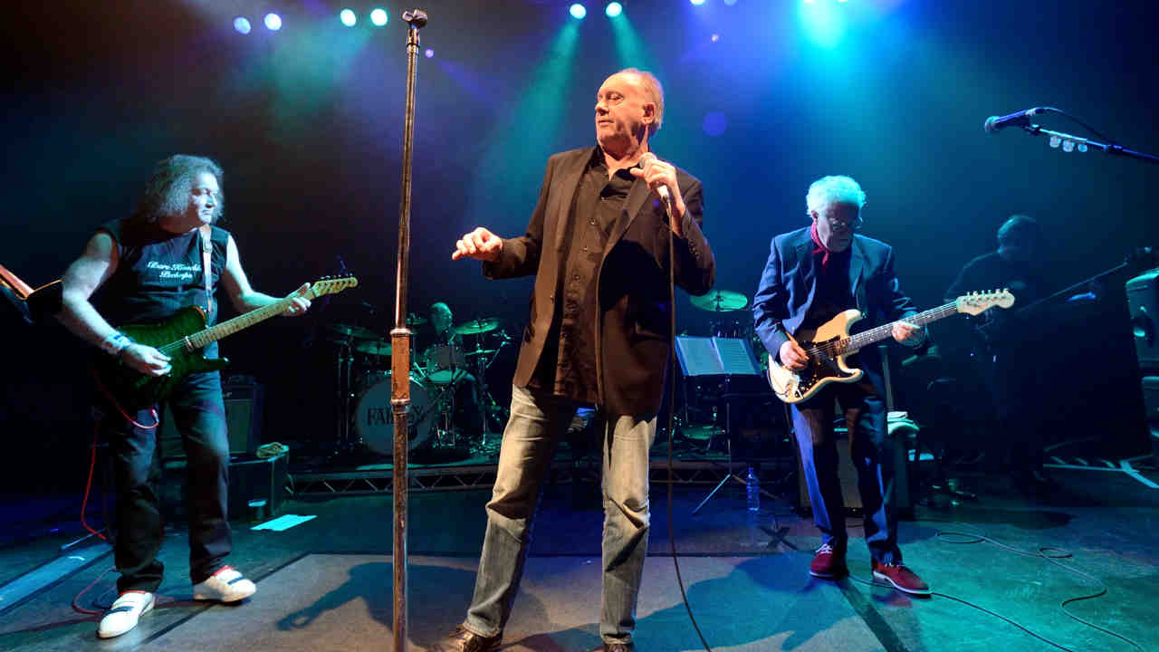 Family performing onstage in 2013