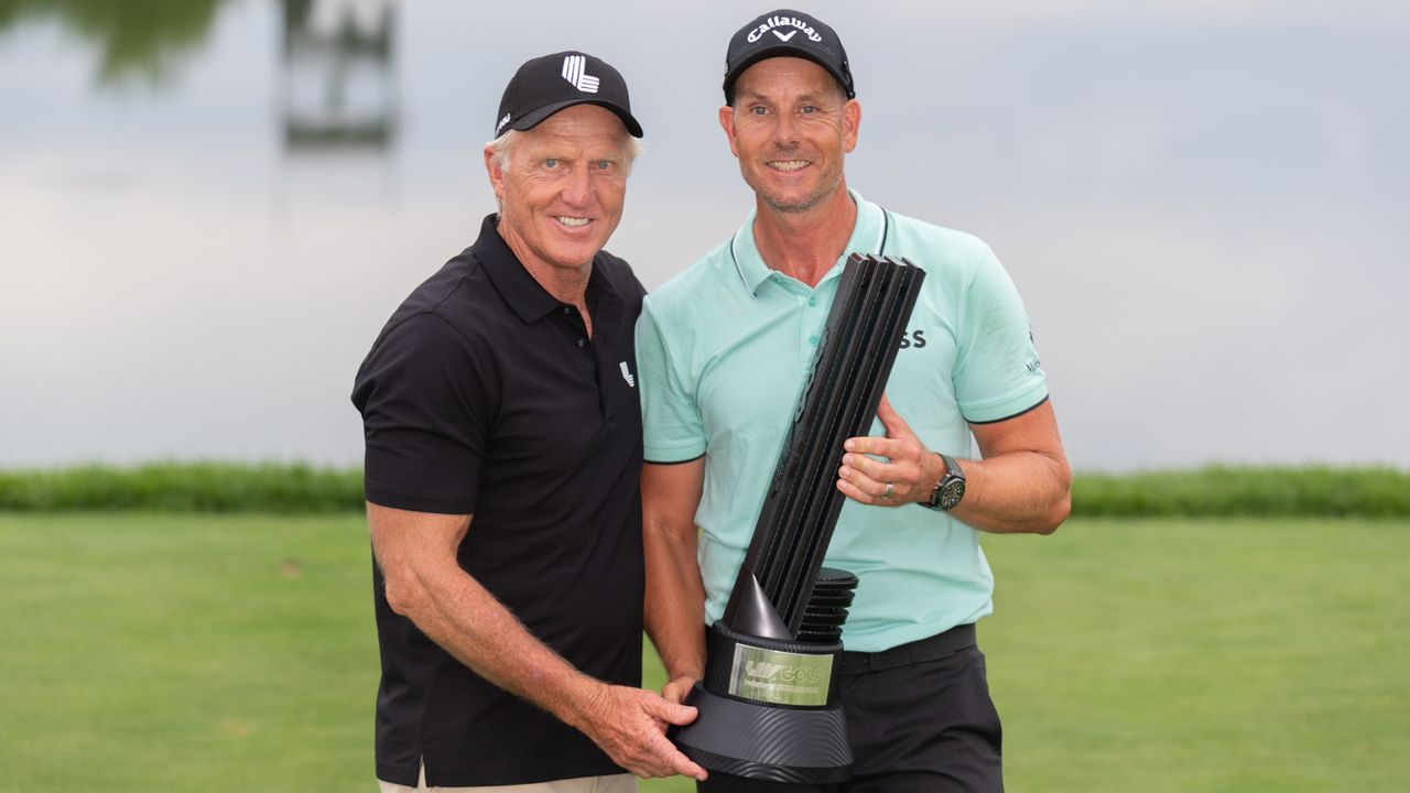 Greg Norman and Henrik Stenson pose with the trophy after the third LIV Golf Invitational Series event in Bedminster, New Jersey