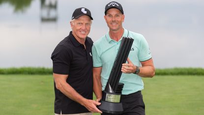 Greg Norman and Henrik Stenson pose with the trophy after the third LIV Golf Invitational Series event in Bedminster, New Jersey