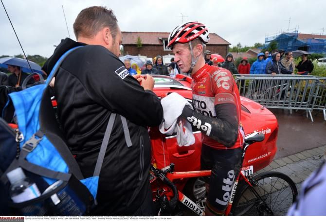 Jurgen Van Den Broeck manages to slightly clean his face after the stage