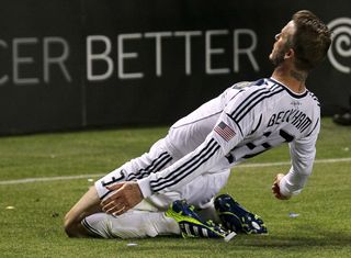 David Beckham celebrates after scoring a free-kick for LA Galaxy against Portland in 2012.