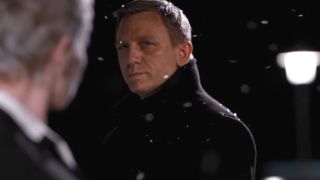 Daniel Craig looks back at Dame Judi Dench with a mournful expression in Quantum of Solace.