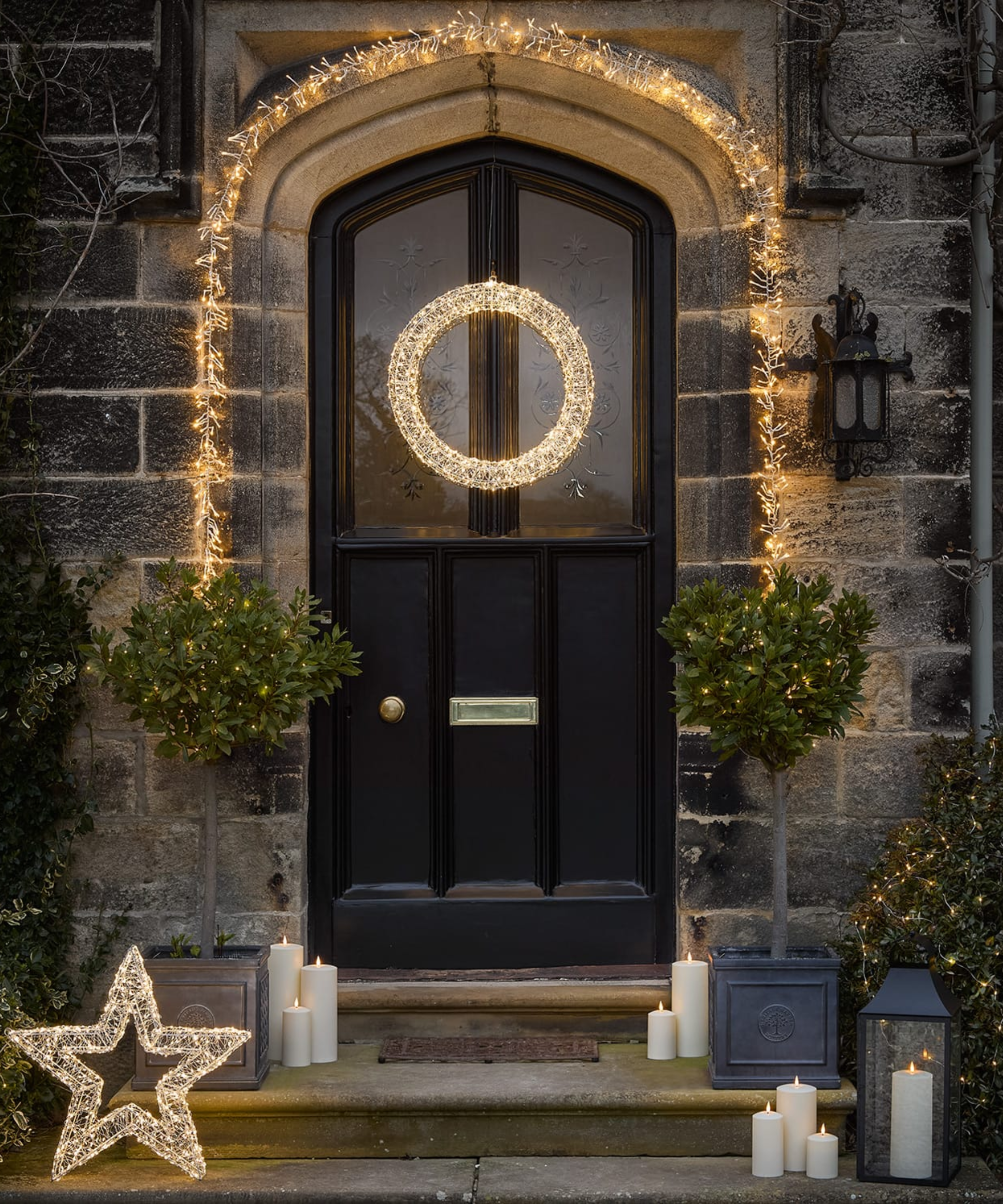 a porch decorated for Christmas