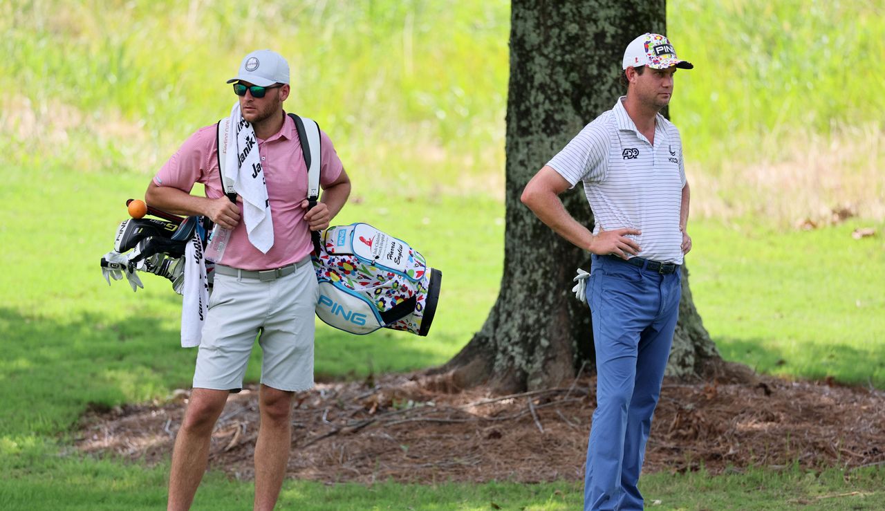 Harris English stands next to his replacement caddie