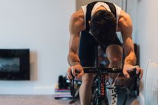 Image shows rider working hard in a HIIT session.