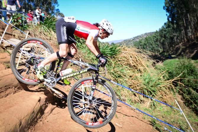 Maja Wloszczowska of Poland attacks Sharka's Playground on her way to second place in the women's cross country