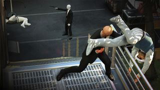 Hitman throwing a guy over a railing
