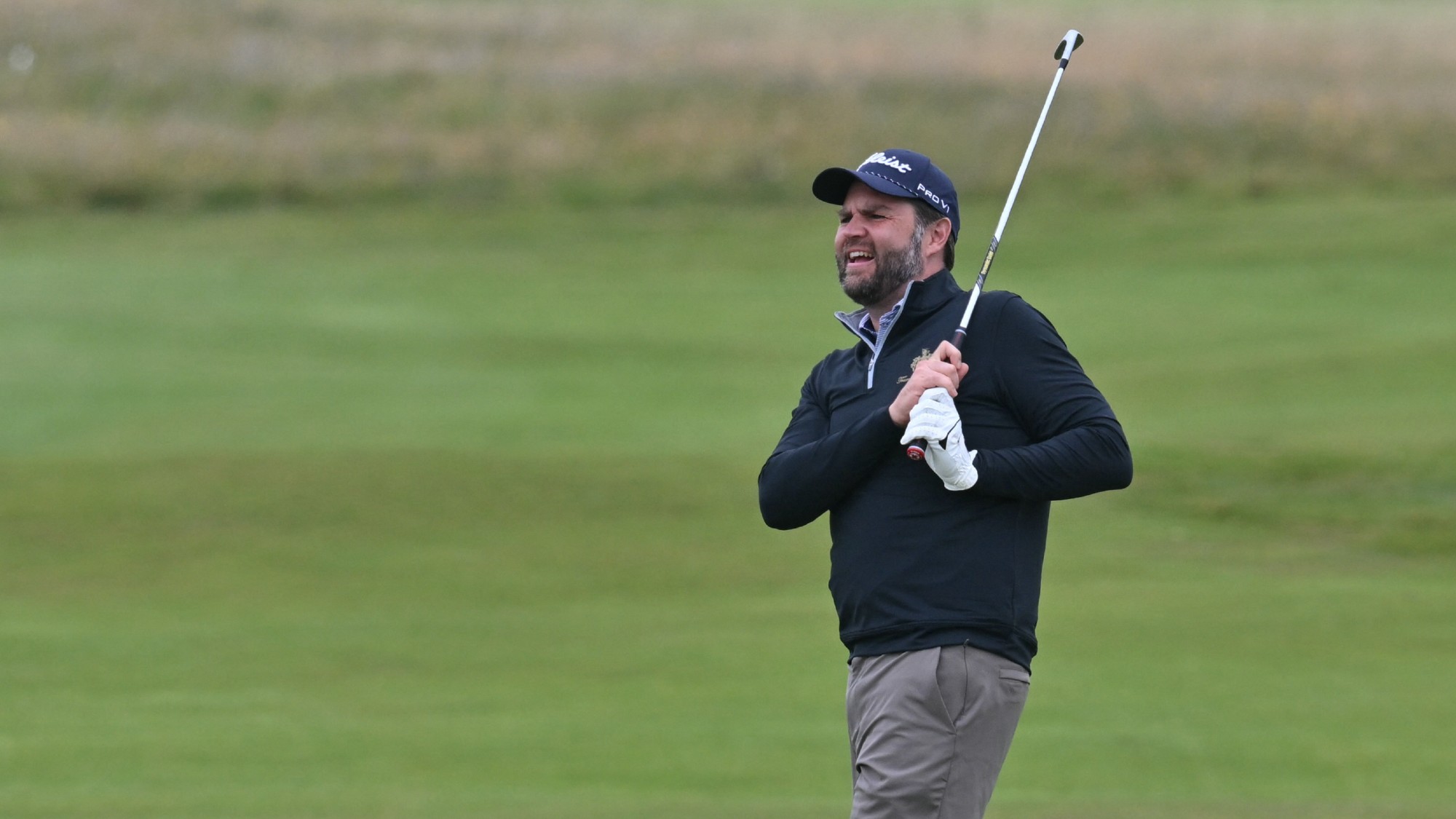 J.D. Vance takes a shot as he plays a round of golf at the Trump Turnberry golf course in Scotland at the start of his UK holiday