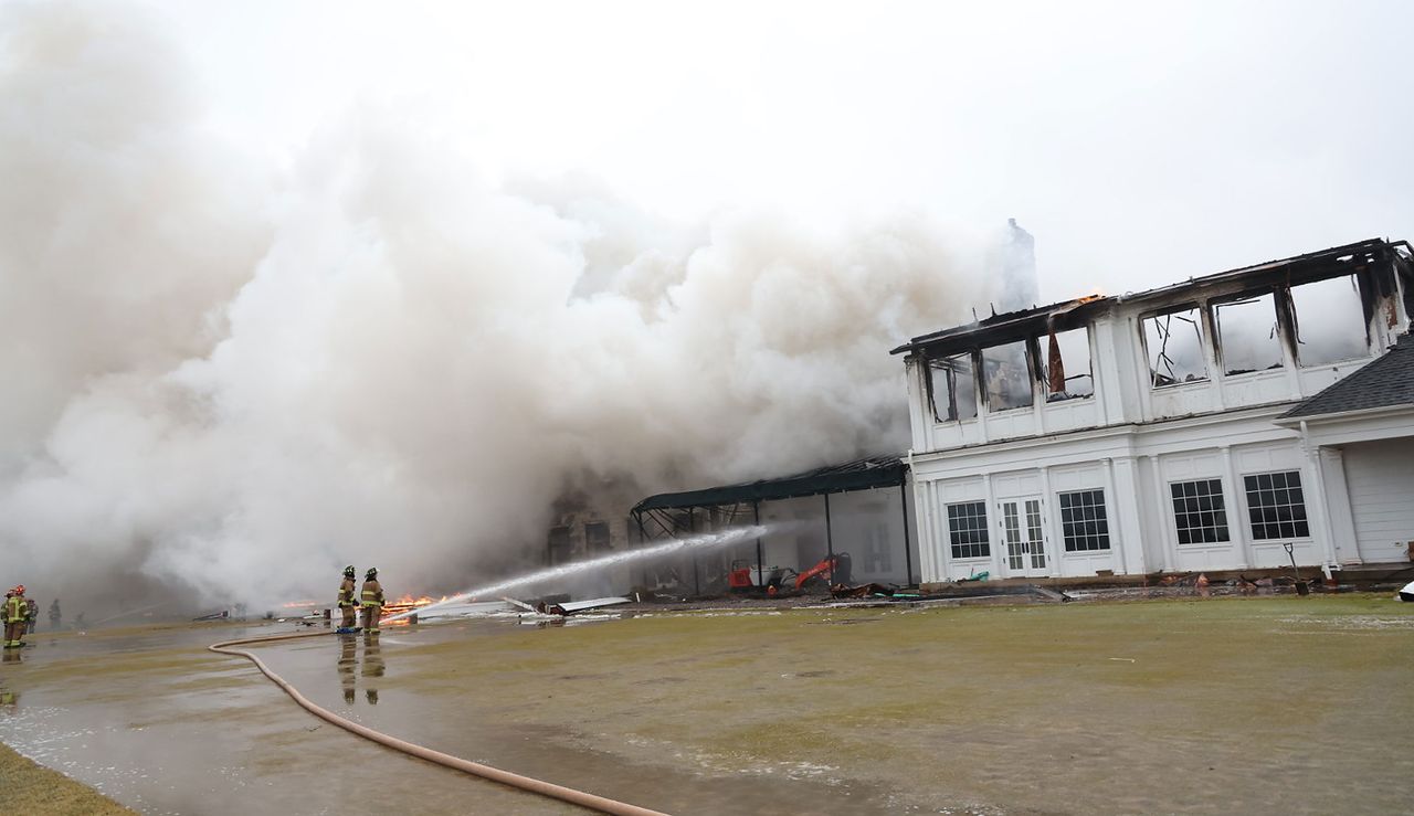 Fire fighters at Oakland Hills&#039; clubhouse