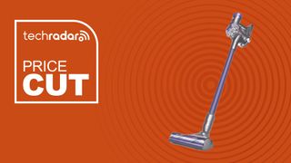 Dyson V8 Plus on orange background with TechRadar price cut sign