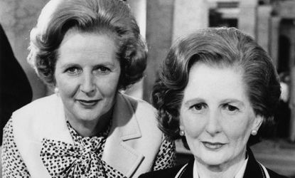 A tale of two Thatchers: The Prime Minister poses with her wax self in 1980.