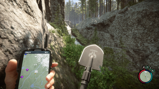 Sons of the Forest - a player holds a shovel while looking at their locatin on the map
