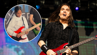 Kiko Loureiro of Megadeth performs at Lokerse Feesten Festival on August 6, 2023 in Lokeren, Belgium with a photo of Aanika Pai in a circle on the image