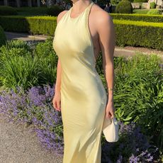 @maggie_mccormack wears a yellow dress