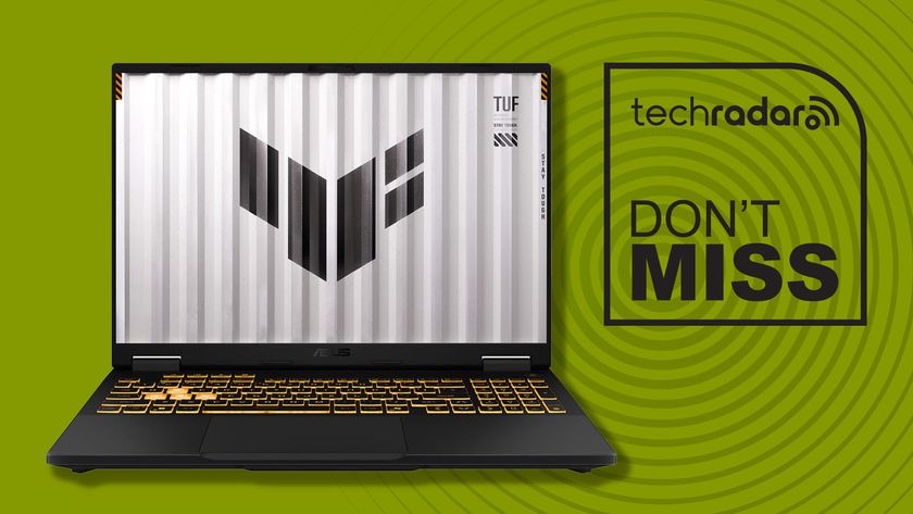 An Asus TUF Gaming laptop against a green TechRadar background