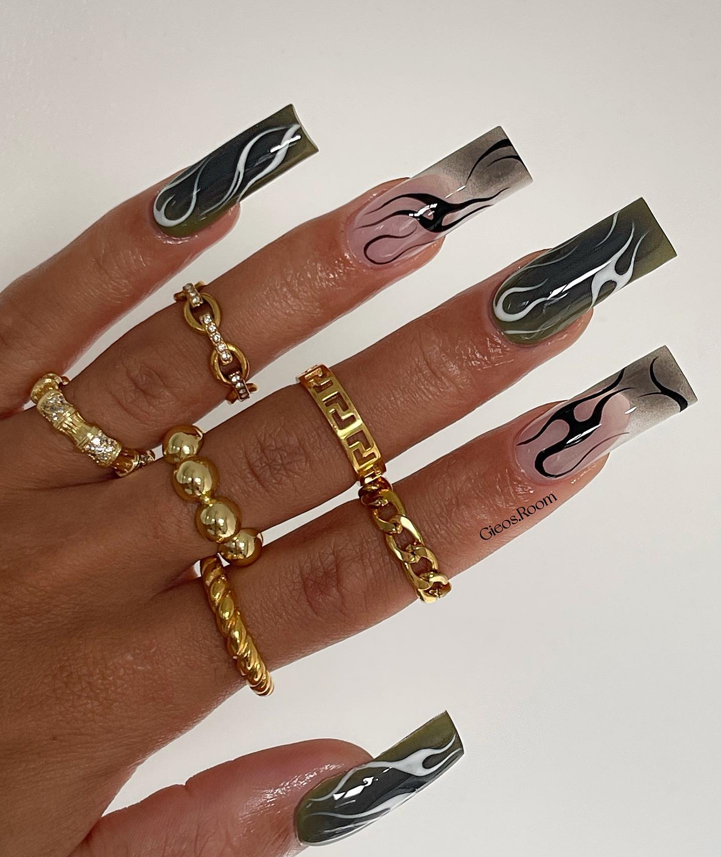 Black nail polish manicure design.