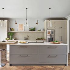 kitchen with grey shaker units and large island with seating area