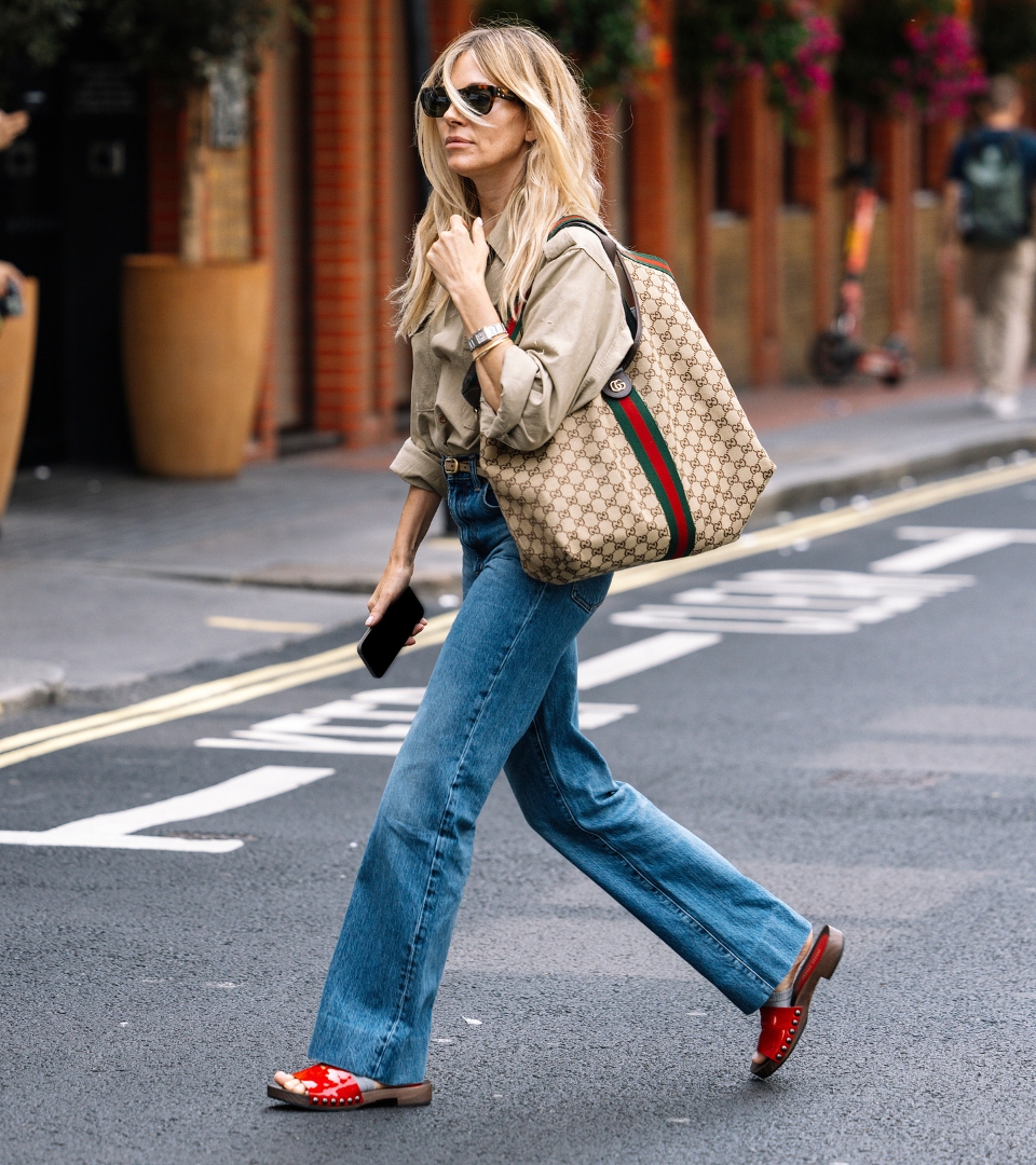 Sienna Miller wearing wide leg jeans