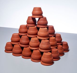 Unglazed clay cups used for drinking water and tea.