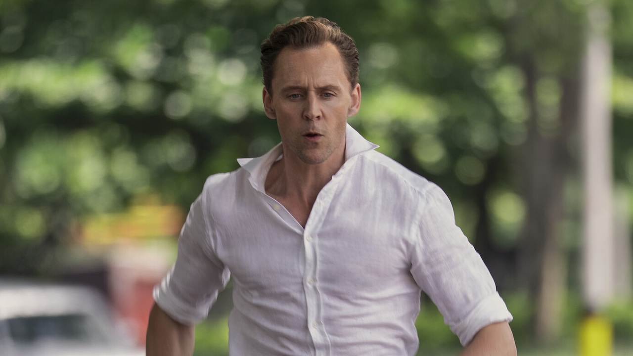 Jonathan Pine running in white long-sleeve shirt in The Night Manager Season 2