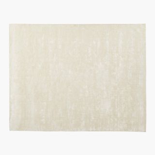 CB2 Anders Ivory Area Rug against a white background.