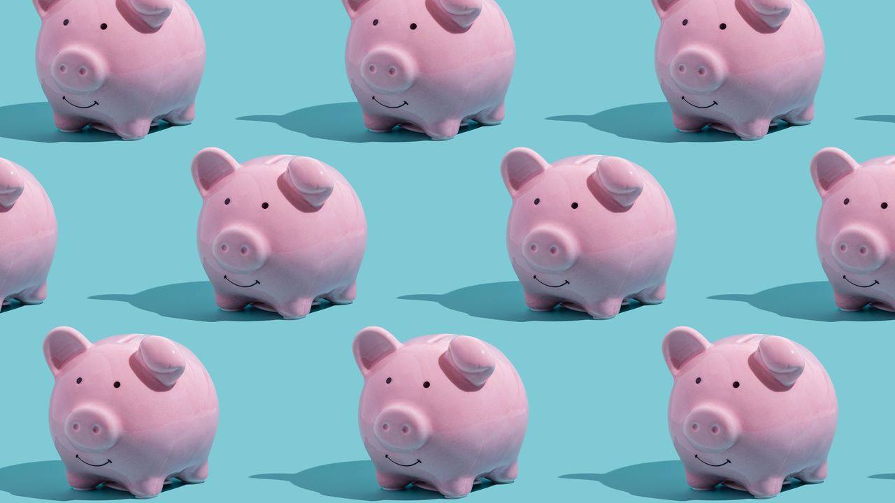 Several piggy banks lined up in rows on a blue background.