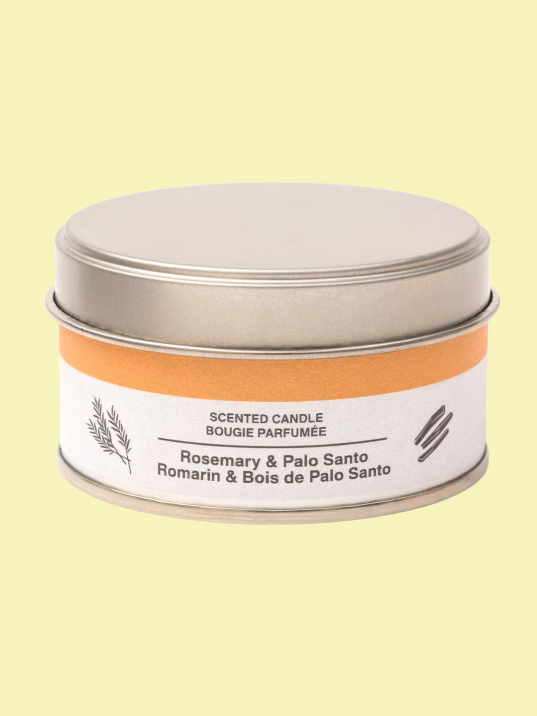 A tinned rosemary and palo santo candle from MUJI