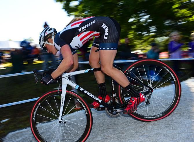 Katie Compton (Trek Factory Team) descending a ramp near the beer garden