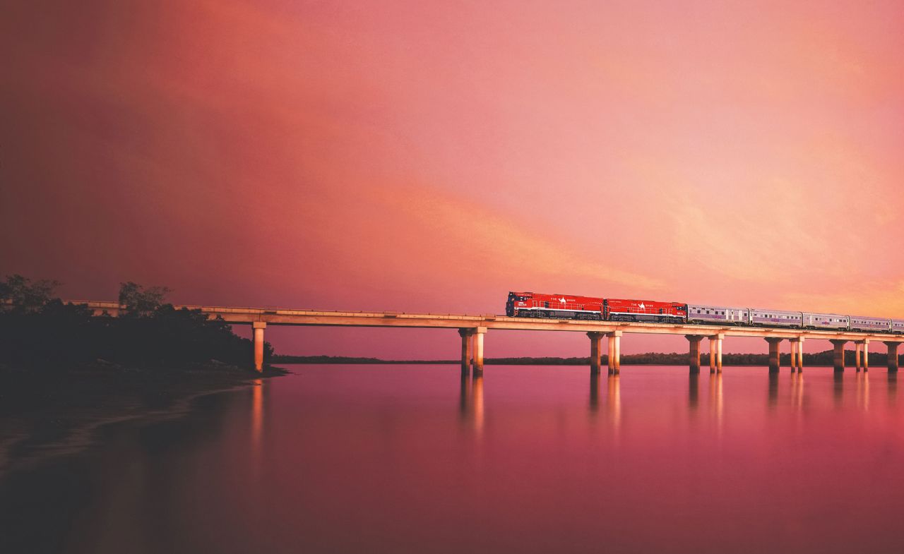 A train against a red sunset