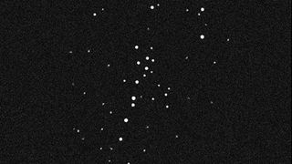 Ursa Major III, a faint star cluster over 30,000 light-years away, may be bound by hidden black holes instead of dark matter.