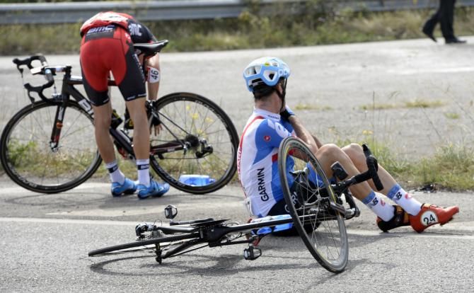 David Millar (Garmin-Sharp) checks himself over after a crash on stage 15