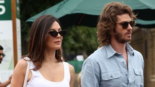 ONDON, ENGLAND - JULY 04: Andrew Garfield and Monica Barbaro attend day six of the 2026 Wimbledon Tennis Championships at All England Lawn Tennis and Croquet Club on July 04, 2026 in London, England.