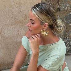 @laurenxwatsonn wearing statement earrings