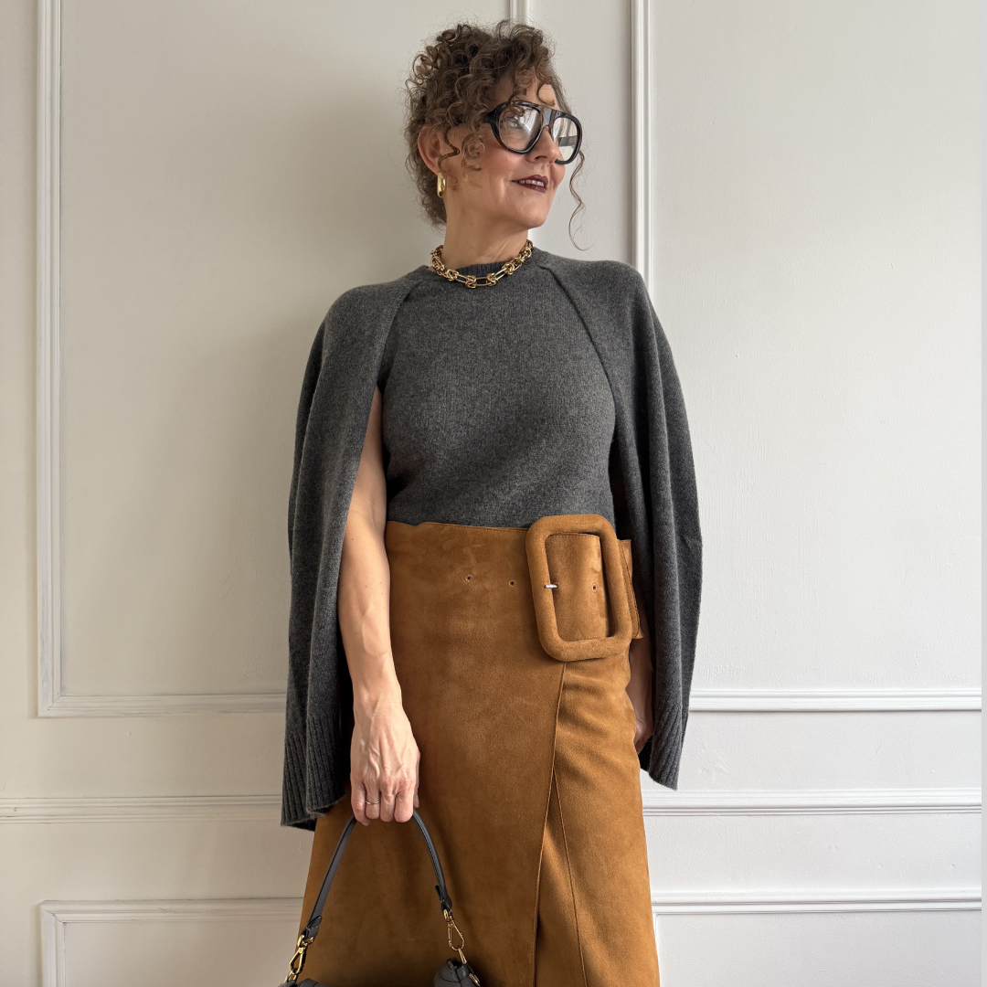 Renia Jazdzyk wearing a cape outfit