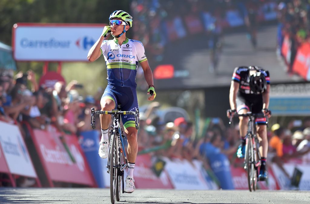 Esteban Chaves celebrates while Tom Dumoulin (Giant-Alpecin) wonder what might have been