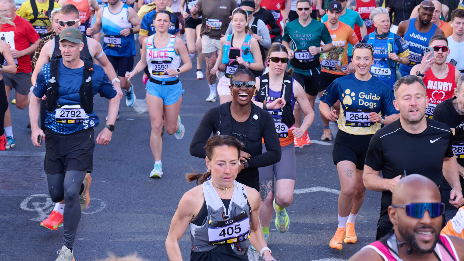 crowd of people running the London Marathon