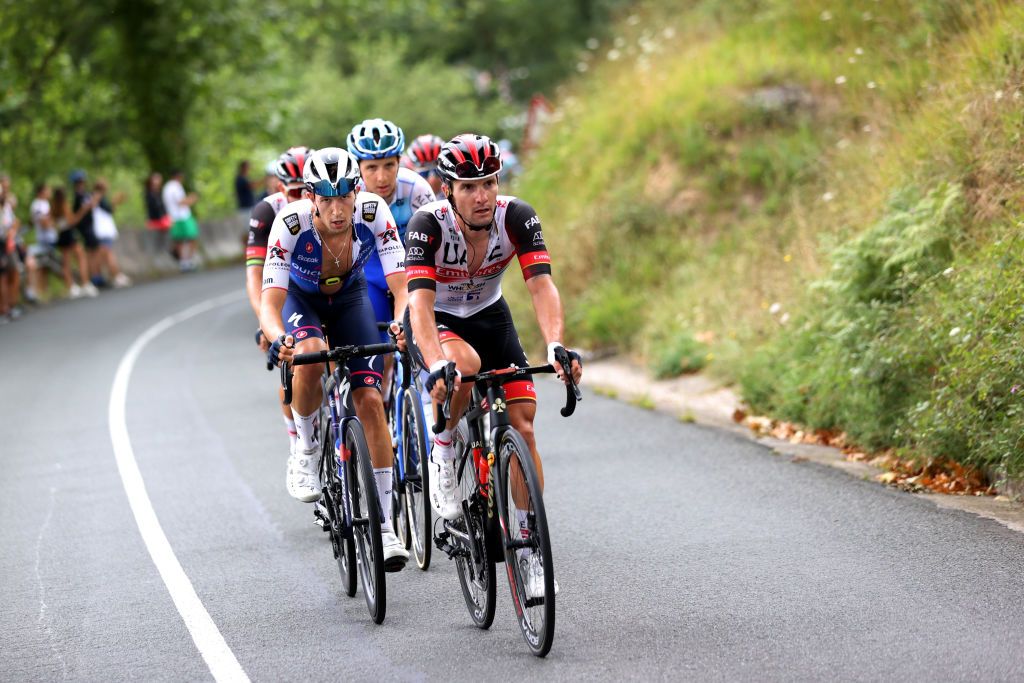 SAN SEBASTIAN SPAIN JULY 30 LR Jannik Steimle of Germany and Team QuickStep Alpha Vinyl and Jan Polanc of Slovenia and Team UAE Team Emirates lead the peloton during the 42nd Donostia San Sebastian Klasikoa 2022 Mens Elite a 2248km race from San Sebastian to San Sebastian Klasikoa2022 on July 30 2022 in San Sebastian Spain Photo by Gonzalo Arroyo MorenoGetty Images