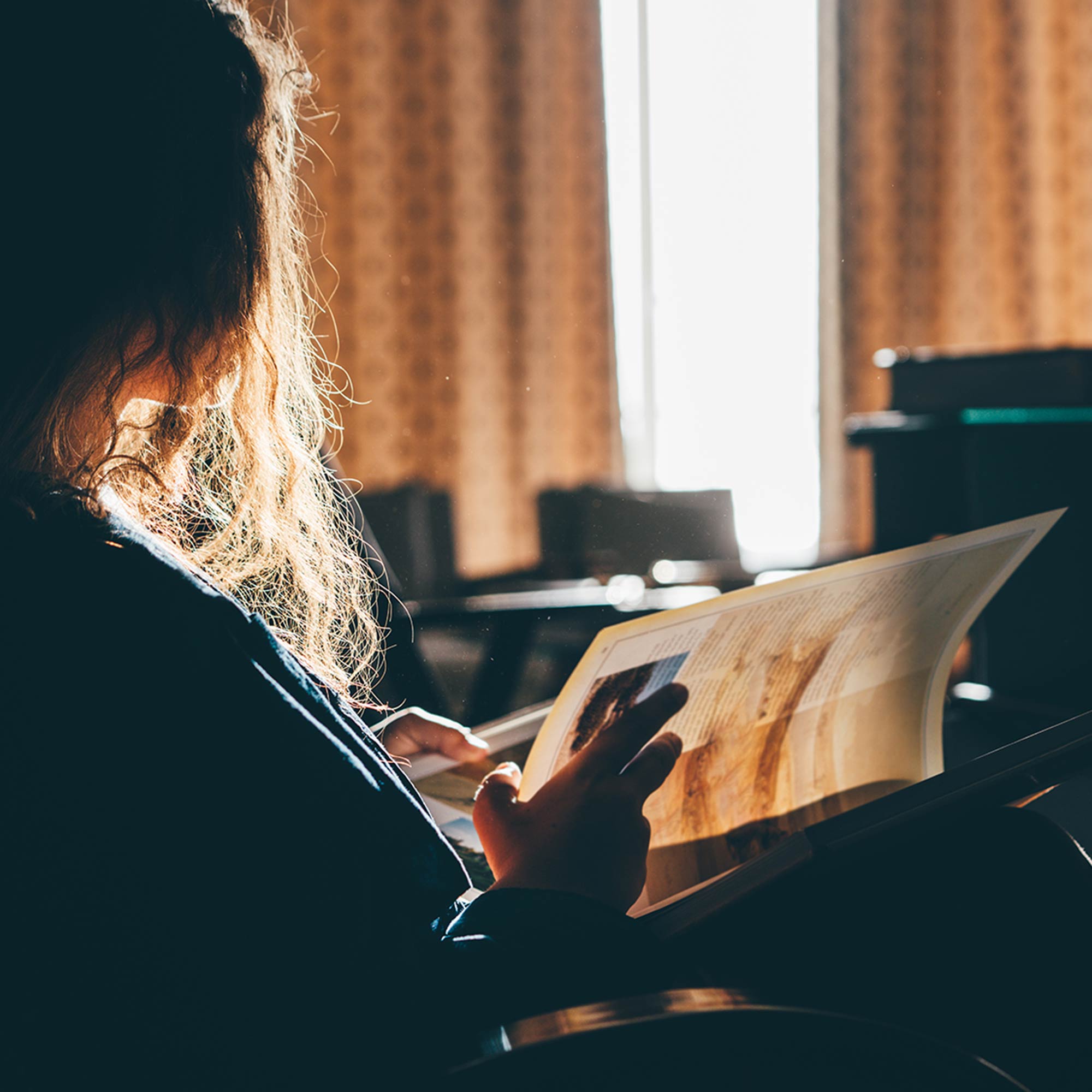 Relaxed woman reading a book