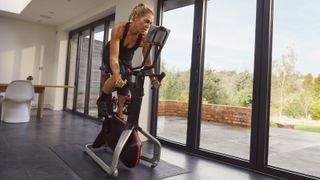 Athlete riding Wattbike in studio setting