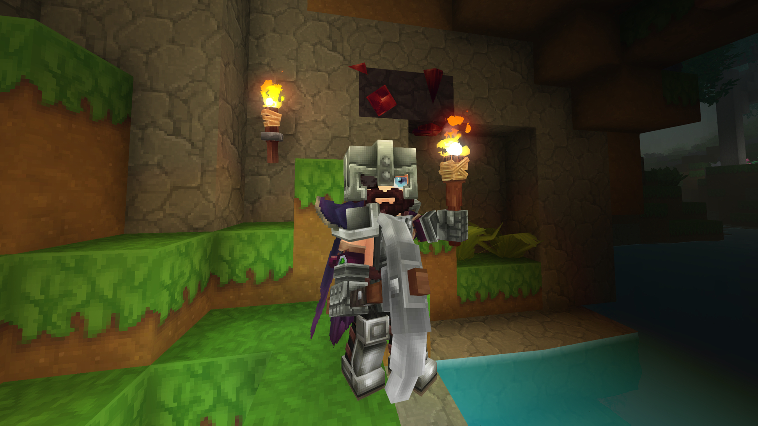 Hytale adamantite: A third-person image of a character holding a torch and pickaxe standing in front of adamantite.