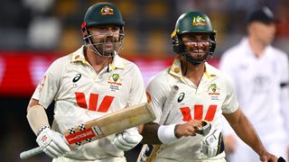 Australia's Travis Head and Jake Weatherald smiling as they head to the tea break during the 2025/26 Ashes 2nd Test