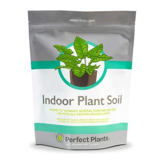 A bag of indoor plant soil from Perfect Plants on white background