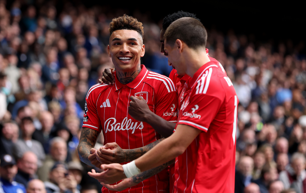 Igor Jesus of Nottingham Forest celebrates scoring his team's second goal with teammates from the penalty spot during the Premier League match between Chelsea and Nottingham Forest at Stamford Bridge
