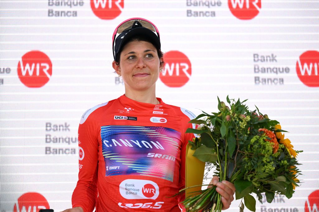 CHAMPAGNE SWITZERLAND JUNE 18 Elise Chabbey of Switzerland and Team CanyonSram Racing Polka Dot Mountain Jersey celebrates at podium during the 4th Tour de Suisse Women 2024 Stage 4 a 1275km stage from Champagne to Champagne UCIWWT on June 18 2024 in Champagne Switzerland Photo by Tim de WaeleGetty Images