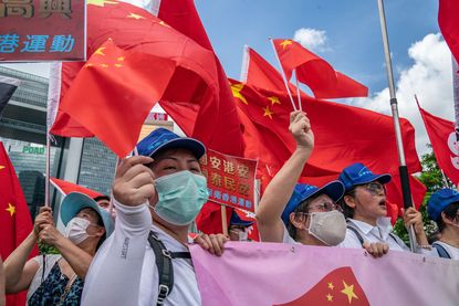 Pro-Beijing demonstrators celebrate passage of Hong Kong security law