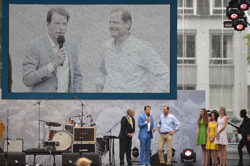 Tour de France Christian Prudhomme is interviewed on stage.