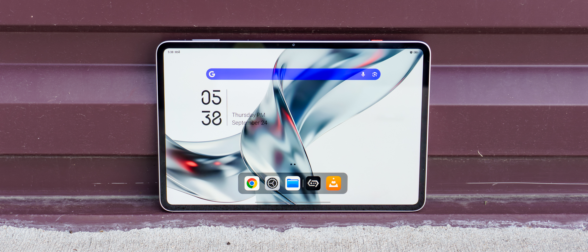 The RedMagic Astra 2 gaming tablet in landscape mode up against a wall