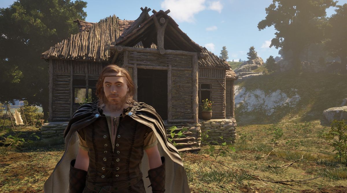 A player standing in front of a house