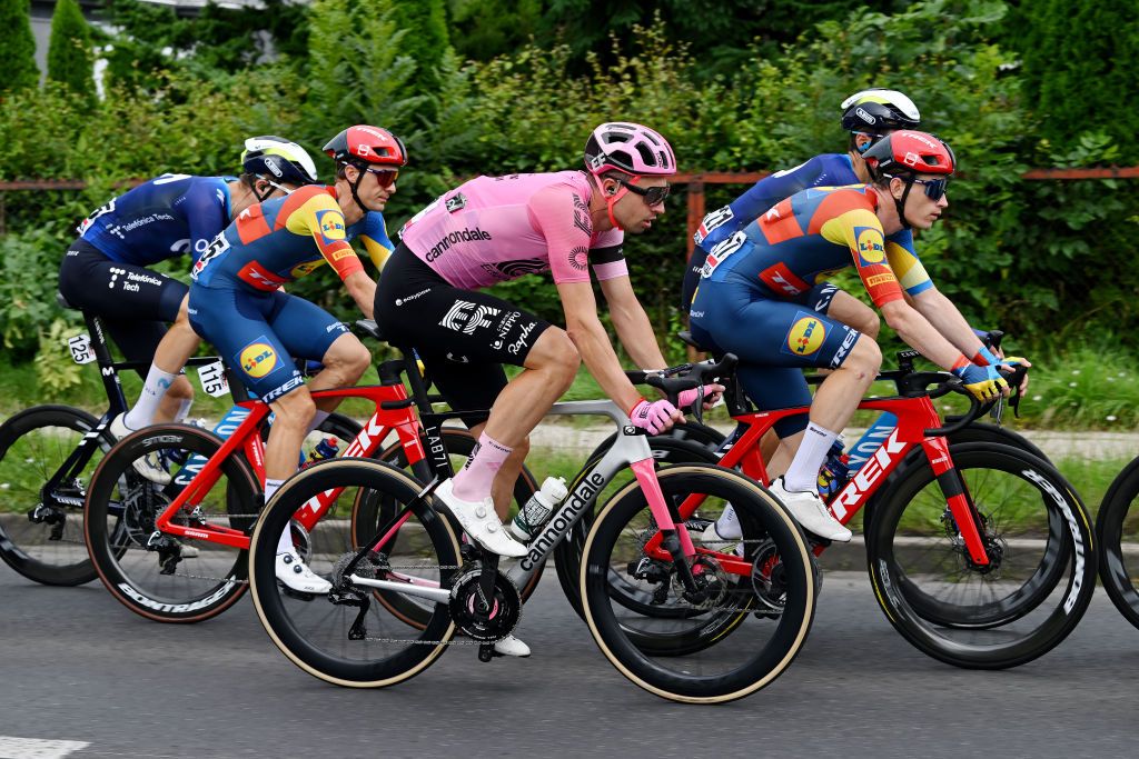 KRAKOW POLAND AUGUST 04 LR Edward Theuns of Belgium and Team Lidl Trek ukasz Winiowski of Poland and Team EF EducationEasyPost and Otto Vergaerde of Belgium and Team Lidl Trek compete during the 80th Tour de Pologne 2023 Stage 7 a 1666km stage from Zabrze to Krakw UCIWT on August 04 2023 in Krakw Poland Photo by Dario BelingheriGetty Images