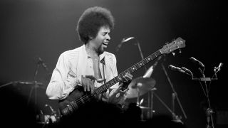 Jazz bassist Stanley Clarke performs with The New Barbarians at The Omni Coliseum on May 10, 1979 in Atlanta, Georgia. 